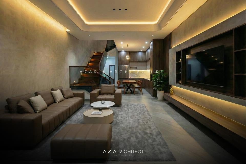 Nhà phố hiện đại 2026: Binh's House ghi dấu với thiết kế sang trọng đầy tinh tế Phòng khách mang tông màu trầm ấm là điểm nhấn của nhà phố hiện đại.
